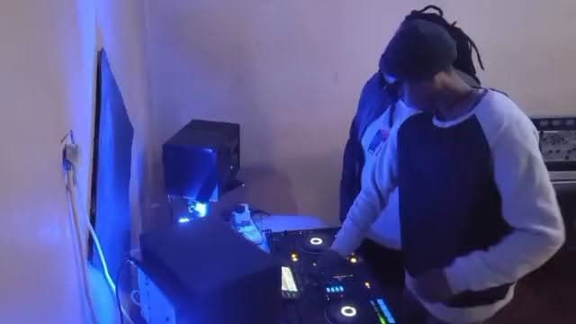 Takue SBT at the decks under blue light